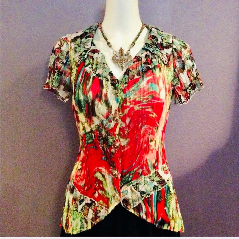 Alberto Malaki brightly colored short sleeve top